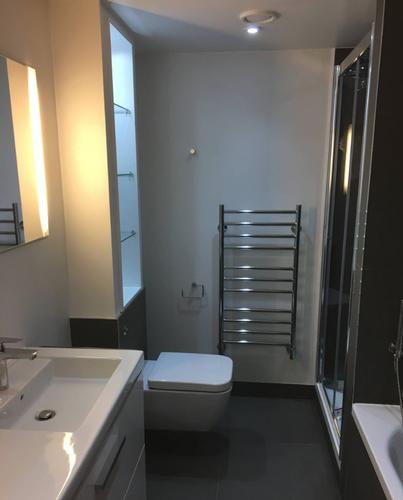 Black Contemporary Bathrooms modern, contemporary bathroom with featured black tiles.