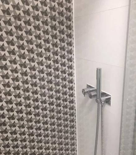 Beautifully tiled Shower Room Modern bathroom, with stunning tiled shower wall