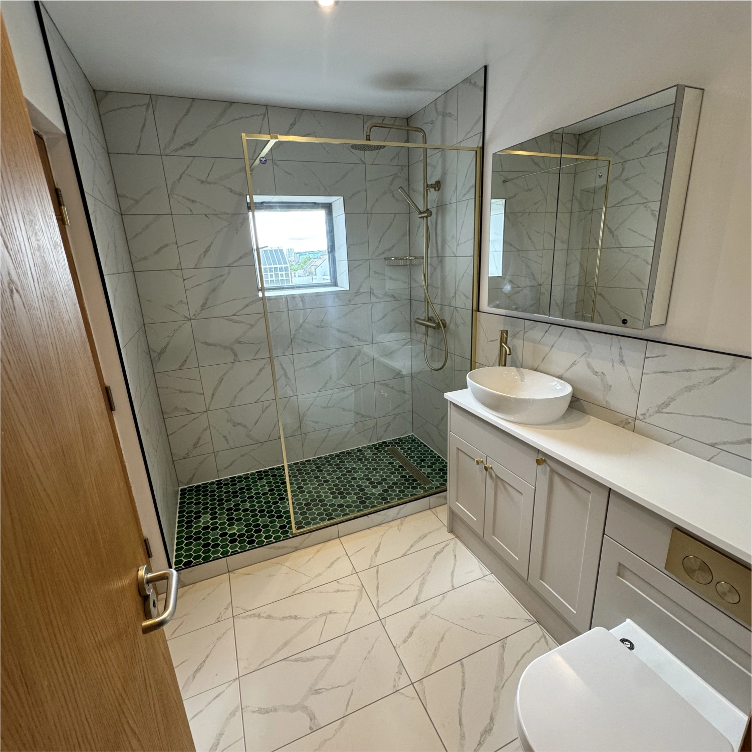 Recently tiled floor and bath installation photo